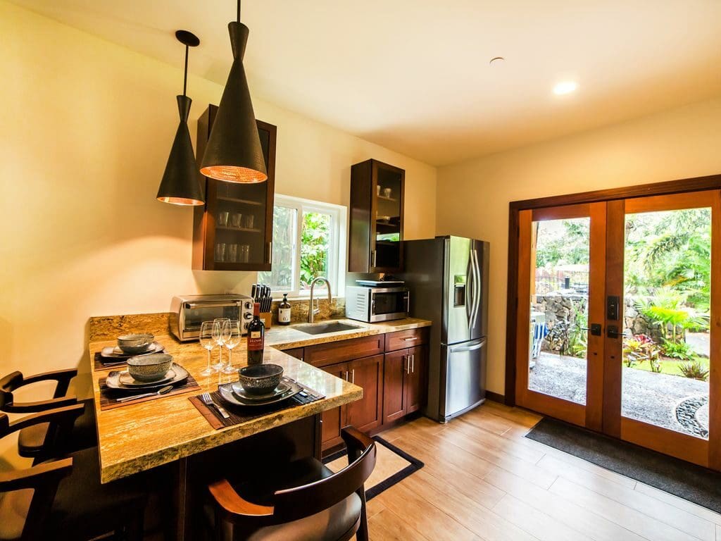 A kitchen with wooden floors and a table